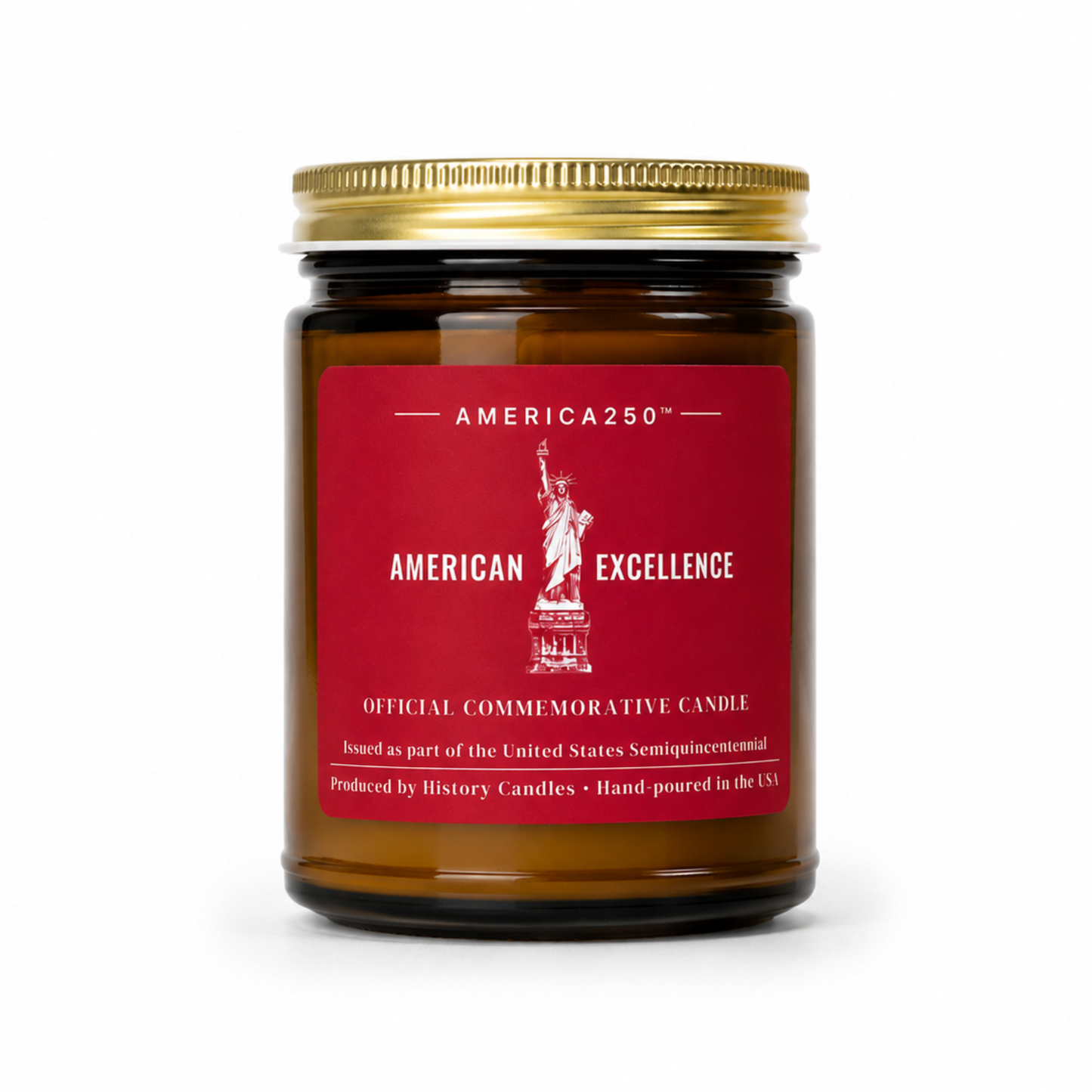 An amber glass jar candle with a gold metal lid and a red label featuring the Statue of Liberty and the text 'AMERICA250' and 'AMERICAN EXCELLENCE'.