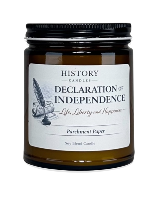 Declaration of Independence soy candle in amber glass jar with black lid on white background