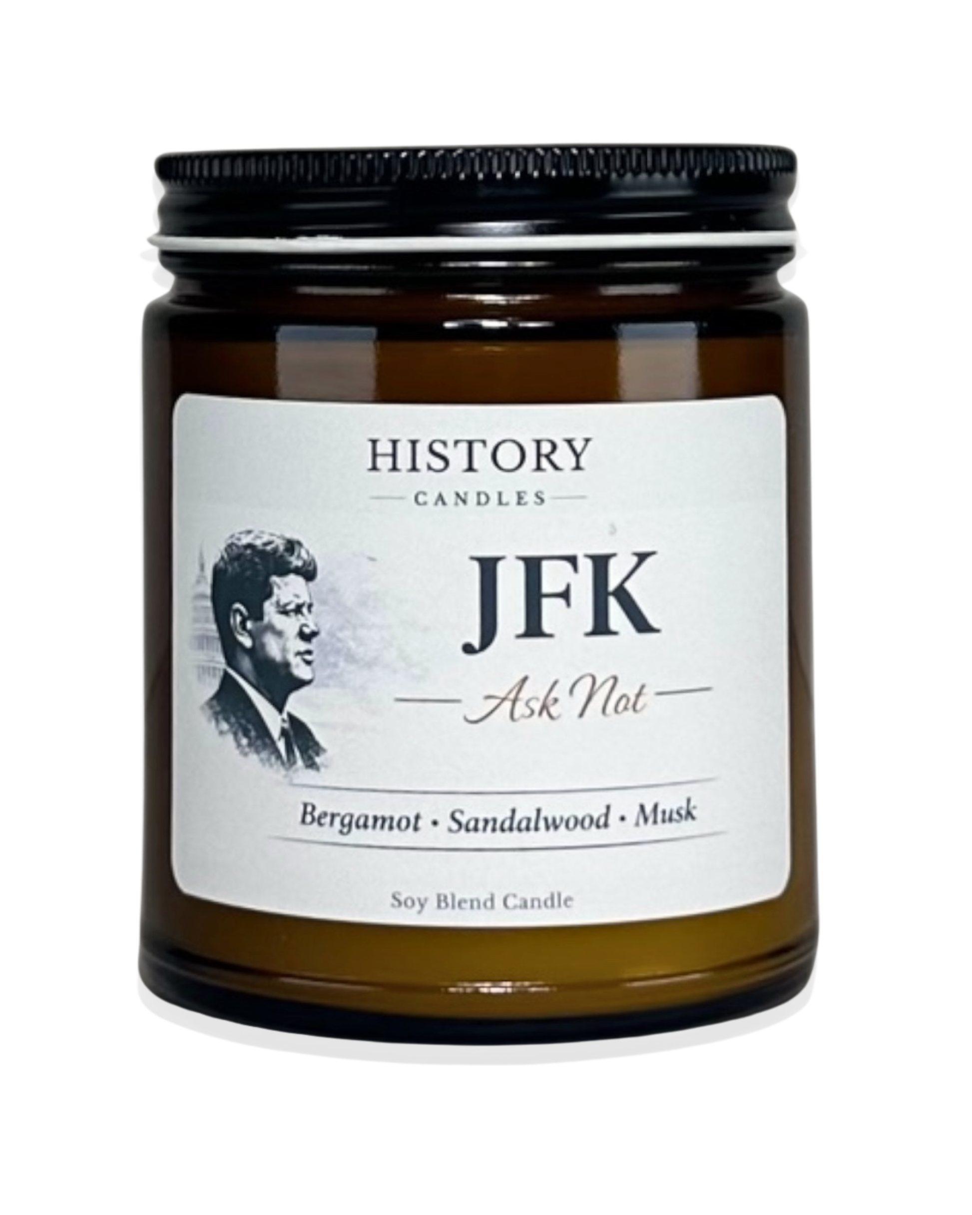 JFK soy candle in amber glass jar with black lid on white background
