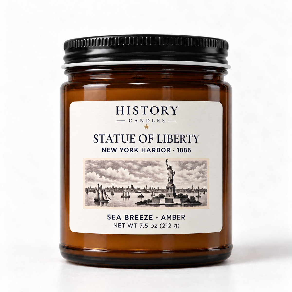 Statue of Liberty Sea Breeze · Amber candle in an amber glass jar with a black lid and illustrated New York Harbor label.